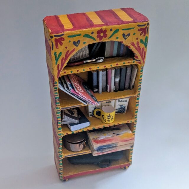 I'm back with some requested close ups of my doll house! This book shelf I made earlier this year to display some of my cutest miniature items. It's made from a cardboard base that I covered in spackle to smooth and fill any gaps. I then painted it in these candy-bright colors!
The books are mostly made up from a kit I received years ago and the records are just bits of printed paper and a plastic lid. The last picture is of some store-bought pieces (some vintage!) that complete the look. :)
More to come soon!
#handmadecrafts #dıy #upcycle #montanaartist #illustrator #miniatures #dollhousedecor #dollhousemakeover #dollhouse
